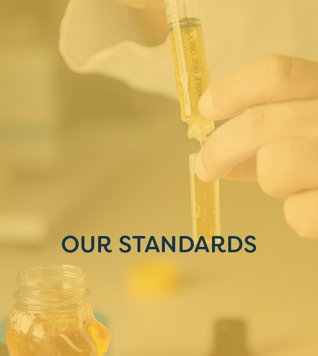 Honey being tested with "Our Standards" text overlay.